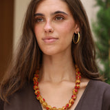 COLLAR BOLAS FLORES MOSTAZA