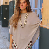 PONCHO PAULA TOPO