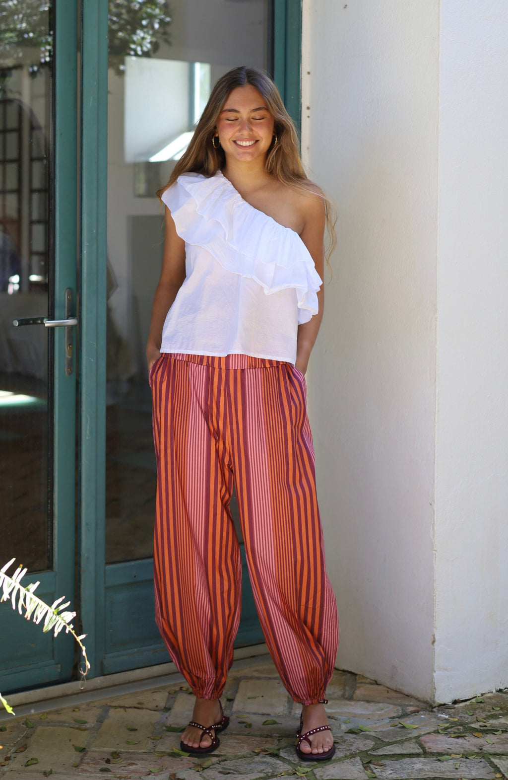 PANTALON BOMBACHO RAYAS NARANJA