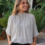 BLUSA GASA TOPO BLANCA