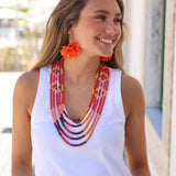 PENDIENTES LARGOS FLOR NARANJA