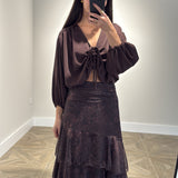 FALDA VOLANTES BRILLO MARRON