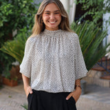 BLUSA GASA TOPO BLANCA