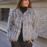 CHAQUETA PELO NATURAL PLUMAS GRIS