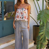 PANTALON DESFLECADO GRIS
