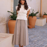 FALDA BEIGE COSTURAS NEGRAS
