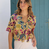BLUSA FLORES MOSTAZA