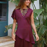 BLUSA SATINADA ASIMETRICA BERENJENA